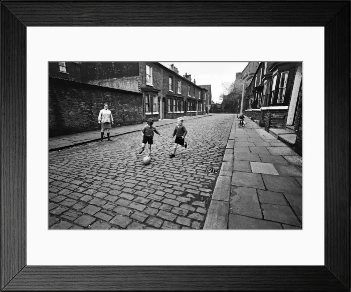Framed Print : Children playing football in Archie Street, Manchester. Archie Street was the inspiration Framed Print : Children playing football in Archie Street, Manchester. Archie Street was the inspiration