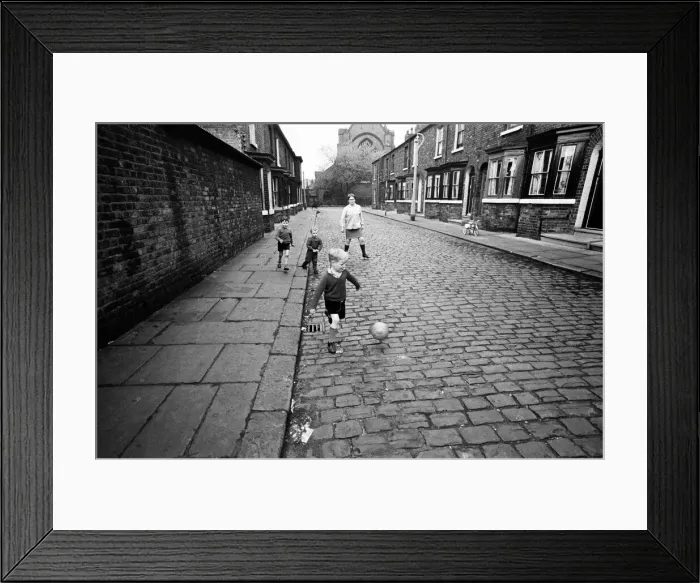 Framed Print : Children playing football in Archie Street, Manchester. Archie Street was the inspiration Framed Print : Children playing football in Archie Street, Manchester. Archie Street was the inspiration