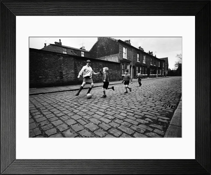 Framed Print : Children playing football in Archie Street, Manchester. Archie Street was the inspiration Framed Print : Children playing football in Archie Street, Manchester. Archie Street was the inspiration