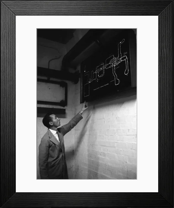 Framed Print : Cadbury s, Bournville, Birmingham, West Midlands. The robot tug which travels around Framed Print : Cadbury s, Bournville, Birmingham, West Midlands. The robot tug which travels around