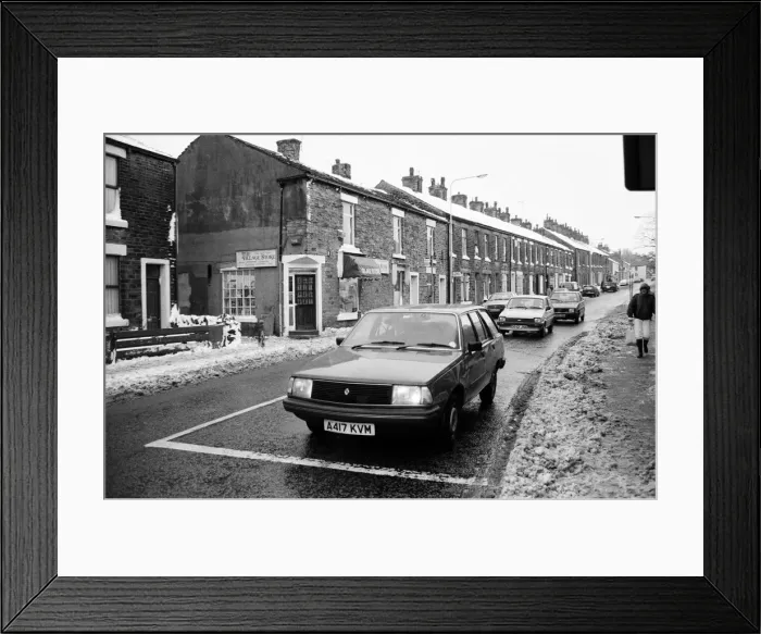 Framed Print : Market Street, Mottram in Longdendale, Greater Manchester. 6th January 1987 Framed Print : Market Street, Mottram in Longdendale, Greater Manchester. 6th January 1987