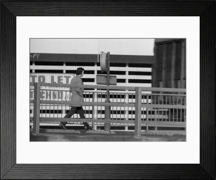 Framed Print : People crossing the motorway dangerously, in the north of England. 11th November 1974 Framed Print : People crossing the motorway dangerously, in the north of England. 11th November 1974