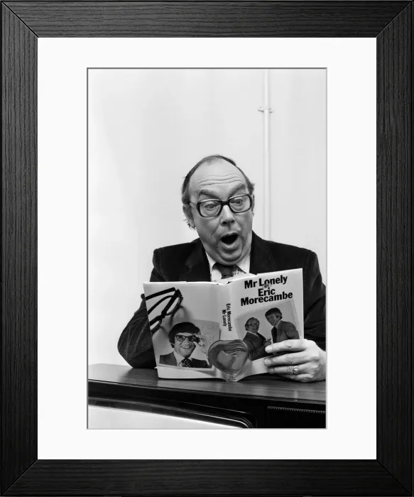 Framed Print : Eric Morecambe promoting his book Mr Lonely'in Birmingham. 31st March 1981