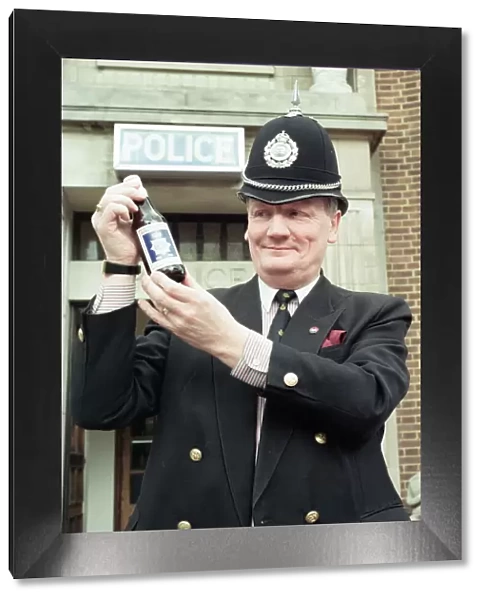 Supt Roger Bagley of Dudley Police with a bottle of 'Bobby Bitter s'