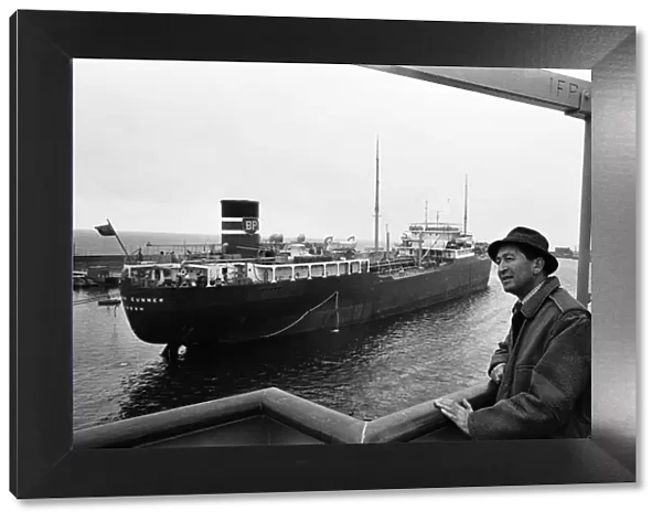 Swansea Docks, Wales. Harbour pilot Eric May is pictured