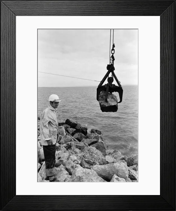 Framed Print : Steel Company of Wales worker David Pinch, 20 directs a huge American crane Framed Print : Steel Company of Wales worker David Pinch, 20 directs a huge American crane