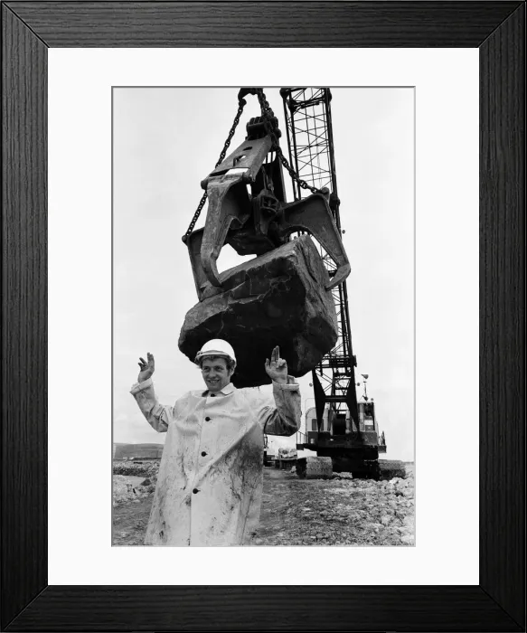 Framed Print : Steel Company of Wales worker David Pinch, 20 directs a huge American crane Framed Print : Steel Company of Wales worker David Pinch, 20 directs a huge American crane