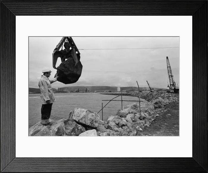 Framed Print : Steel Company of Wales worker David Pinch, 20 directs a huge American crane Framed Print : Steel Company of Wales worker David Pinch, 20 directs a huge American crane