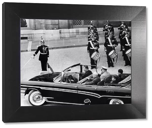 Soviet Premier Nikita Khrushchev accompanied by other Russian officials leaves the Elysee