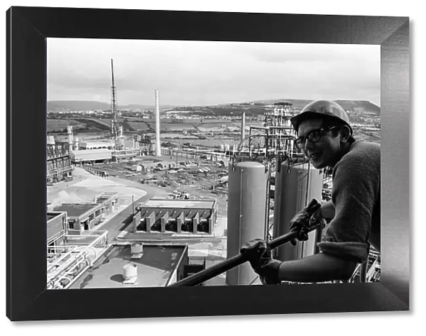 Llandarcy oil refinery. Trainee engineer John Bolt, 21, gets a birds eye view of the oil