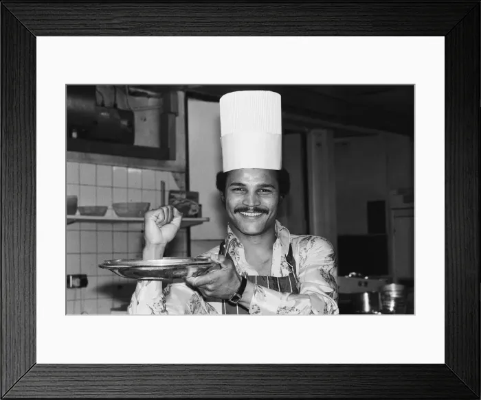 Framed Print : Boxer John Conteh with a chefs hat on. 28th September 1977 Framed Print : Boxer John Conteh with a chefs hat on. 28th September 1977