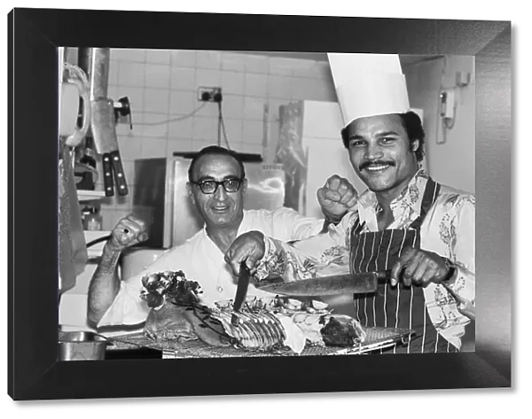 Boxer John Conteh with chef William Vassalo. 28th September 1977