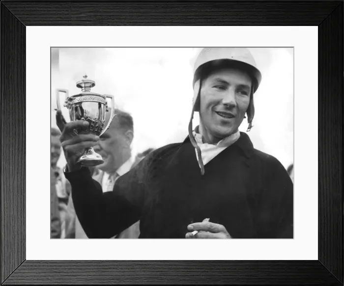 Framed Print : Stirling Moss holding trophy celebrating motor racing victory - September 1959 Framed Print : Stirling Moss holding trophy celebrating motor racing victory - September 1959