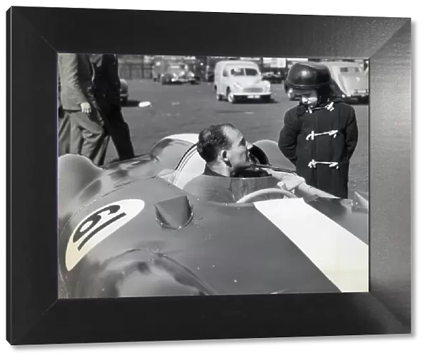STIRLING MOSS IN HIS COOPER CLIMAX CHATS TO GEOFFREY BRABHAM, AGED 4 OF SYDNEY, AUSTRALIA