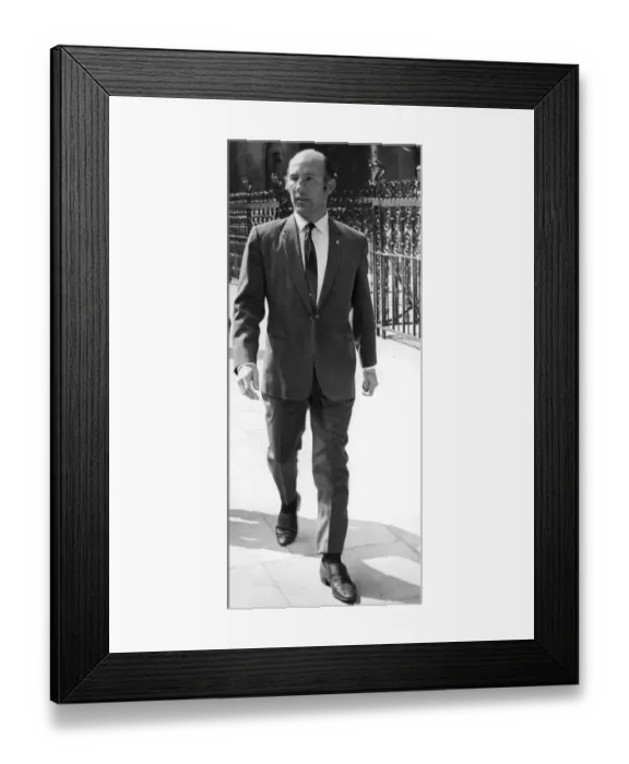 Framed Print : Stirling Moss walking in street - April 1968 ----- STIRLING Framed Print : Stirling Moss walking in street - April 1968 ----- STIRLING