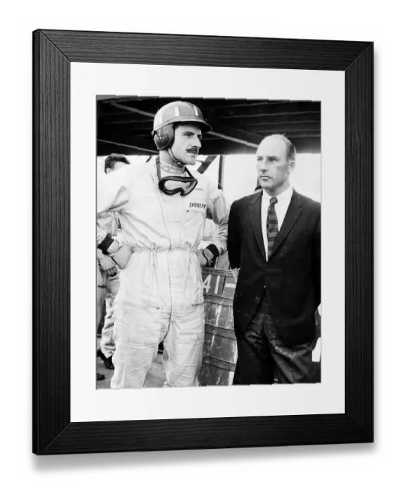Framed Print : Stirlling Moss ex-racing driver with Graham Hill at Oulton Park Nov 1965 A©Mirrorpix Framed Print : Stirlling Moss ex-racing driver with Graham Hill at Oulton Park Nov 1965 A©Mirrorpix