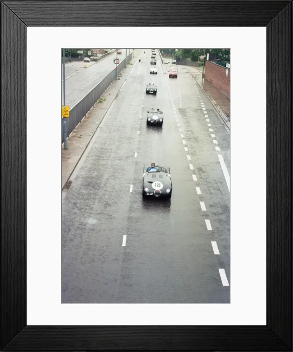Framed Print : Sterling Moss takes takes Evening Telegraph reporter Alan Poole for a spin in the same