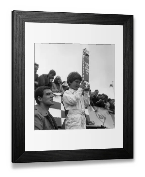 Framed Print : DAMON HILL, AGED SIX WATCHES HIS FATHER GRAHAM HILL RACE AT SILVERSTONE - 01 / 07 / 1967 Framed Print : DAMON HILL, AGED SIX WATCHES HIS FATHER GRAHAM HILL RACE AT SILVERSTONE - 01 / 07 / 1967