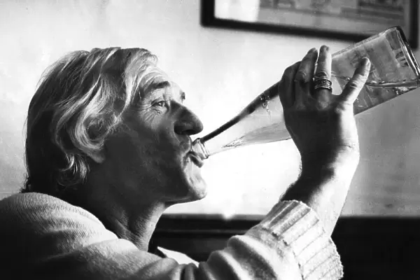 Richard Harris drinking from bottle of water during interview - 22 July 1982