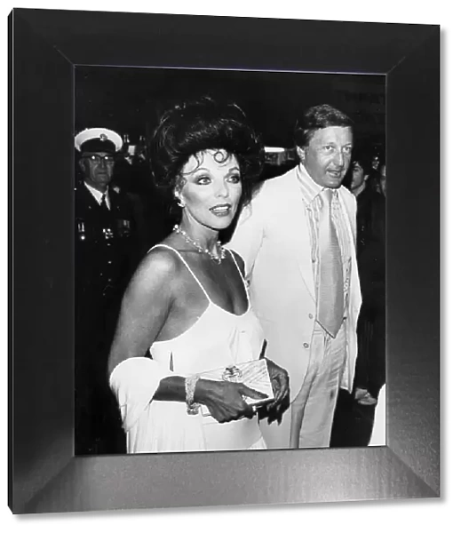 Joan Collins and husband Ron Kass at premiere of The Stud - April 1978