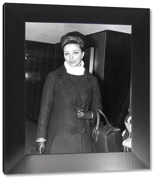 Joan Collins at London Airport - December 1961