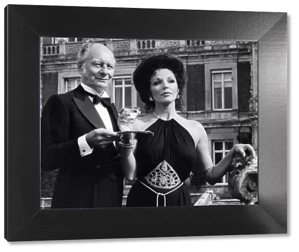 Joan Collins and John Gielgud during filming at country house - April 1979