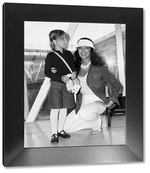 Joan Collins and daughter Katyana at Heathrow airport - April 1978