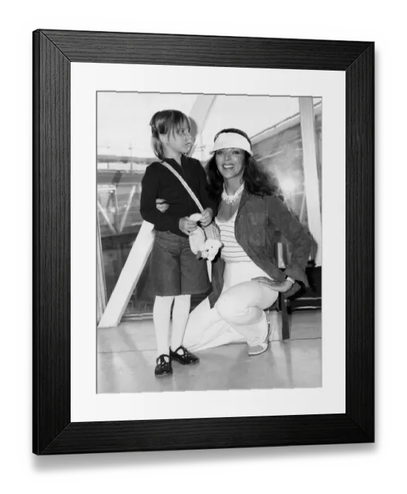 Framed Print : Joan Collins and daughter Katyana at Heathrow airport - April 1978