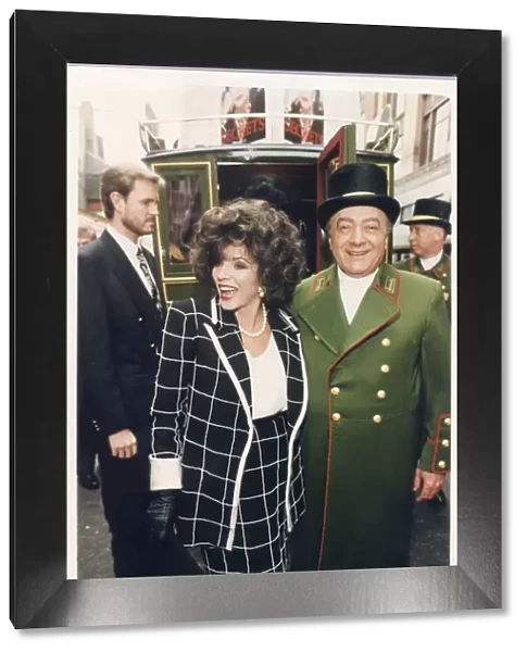 JOAN COLLINS AND MOHAMMED AL FAYED OUTSIDE HARRODS 22  /  07  /  1999