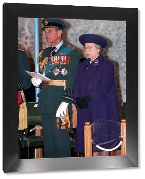 Queen Elizabeth II and Prince Philip presenting colours at RAF Marham. April 1994