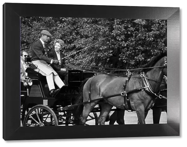Prince Philip driving carriage with Nancy Reagan beside him - June 1982