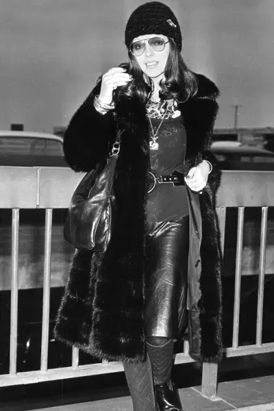 Joan Collins wearing fur coat at London Airport - December 1971