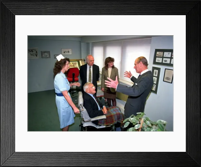 Framed Print : The Duke of Edinburgh, Prince Philip with Cartoonist Carl Giles at exhibition of Framed Print : The Duke of Edinburgh, Prince Philip with Cartoonist Carl Giles at exhibition of