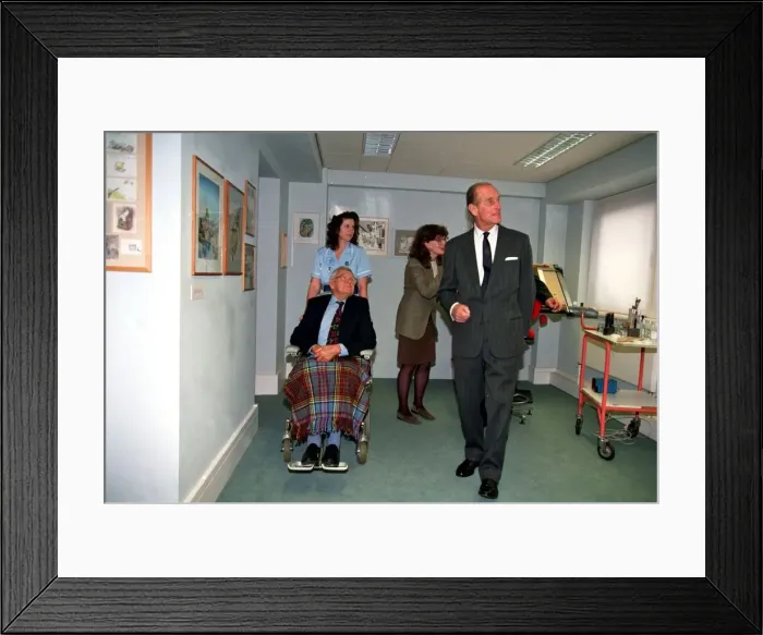 Framed Print : The Duke of Edinburgh, Prince Philip with Cartoonist Carl Giles at exhibition of Framed Print : The Duke of Edinburgh, Prince Philip with Cartoonist Carl Giles at exhibition of