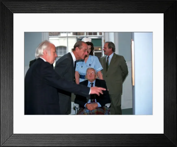 Framed Print : The Duke of Edinburgh, Prince Philip with Cartoonist Carl Giles at exhibition of Framed Print : The Duke of Edinburgh, Prince Philip with Cartoonist Carl Giles at exhibition of