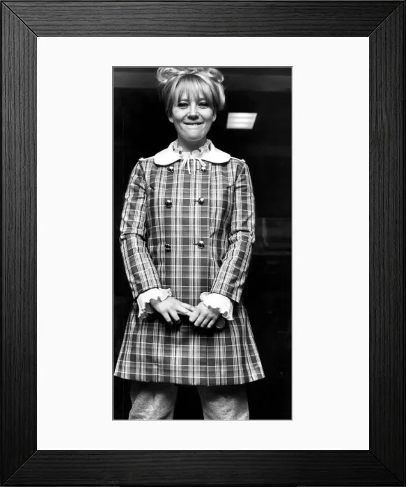 Framed Print : Julia Foster wearing bold check mini dress over trousers - 19th March 1968