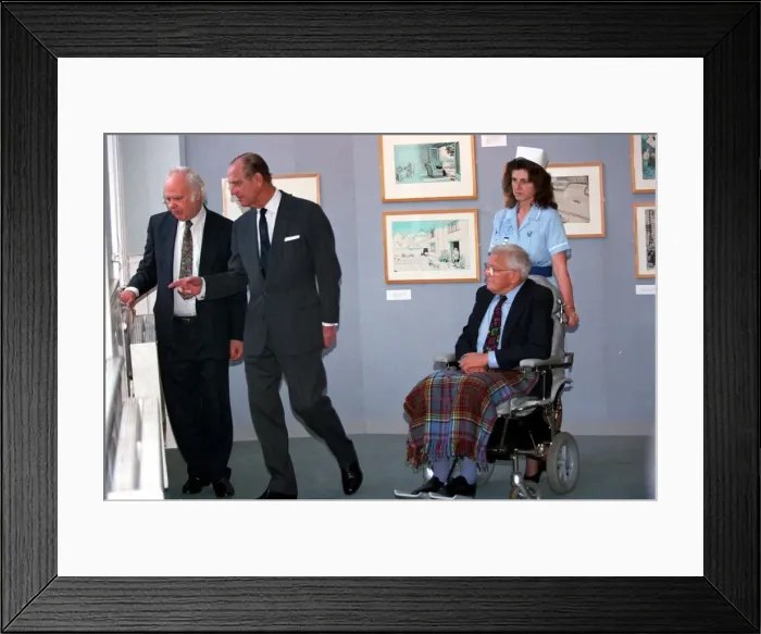 Framed Print : The Duke of Edinburgh, Prince Philip with Cartoonist Carl Giles at exhibition of Framed Print : The Duke of Edinburgh, Prince Philip with Cartoonist Carl Giles at exhibition of