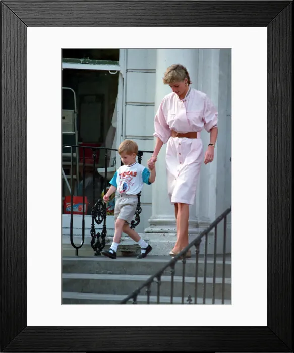 Framed Print : Prince Harry wears a Thomas the Tank Engine tee-shirt when he leaves nursery school with