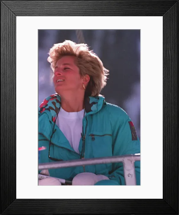 Framed Print : PRINCESS OF WALES WEARING GREEN SKI SUIT SEATED ON SKI CHAIR DURING SKIING HOLIDAY IN