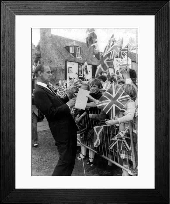 Framed Print : Prince Philip receives a birthday card on behalf of Princess Diana - 1 July 1982 Framed Print : Prince Philip receives a birthday card on behalf of Princess Diana - 1 July 1982