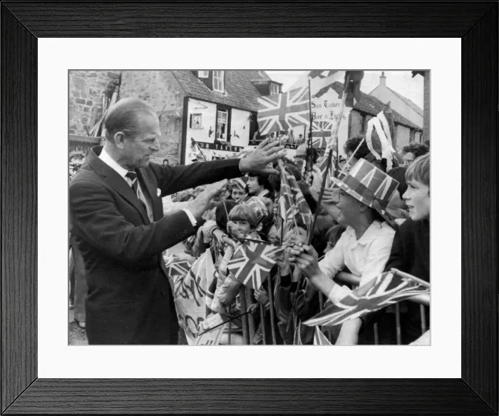 Framed Print : Prince Philip receives a birthday card on behalf of Princess Diana - 1 July 1982 Framed Print : Prince Philip receives a birthday card on behalf of Princess Diana - 1 July 1982