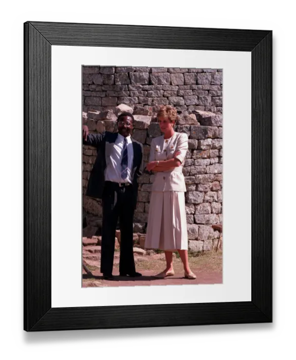 Framed Print : PRINCESS OF WALES DISHING OUT FOOD DURING A VISIT TO RED CROSS CHARITY PROJECT IN