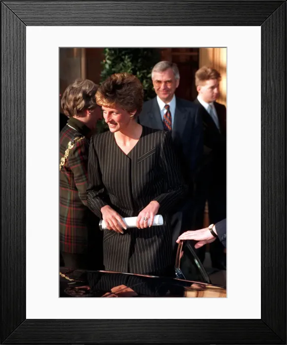Framed Print : THE PRINCESS OF WALES WEARING A BLACK PINSTRIPE SKIRT SUIT 1993