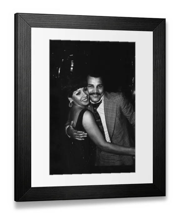Framed Print : Boxer John Conteh dancing with Shirley Bassey at her party. 17th July 1979