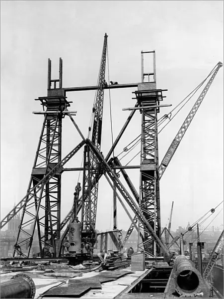 Construction of the new Tyne Bridge. The Gateshead erection masts