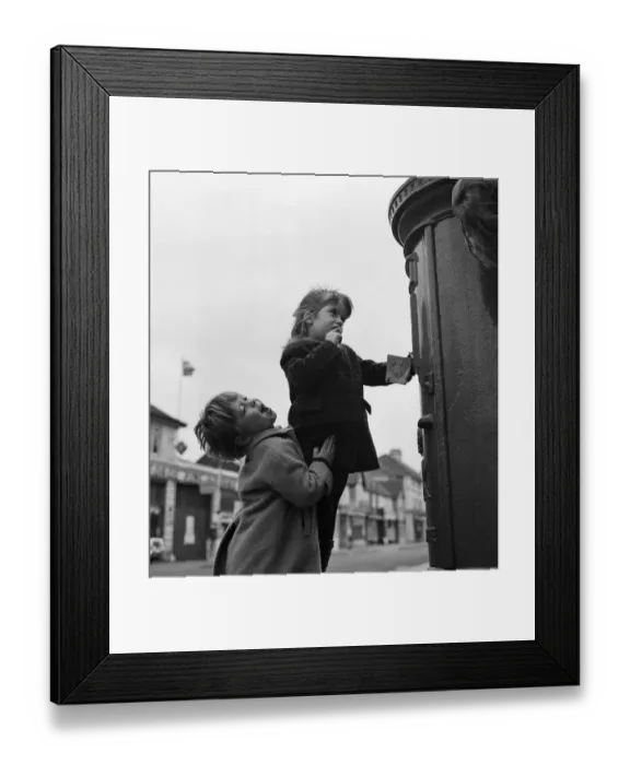 Framed Print : Two four year olds making sure that Father Christmas gets that letter in time Framed Print : Two four year olds making sure that Father Christmas gets that letter in time