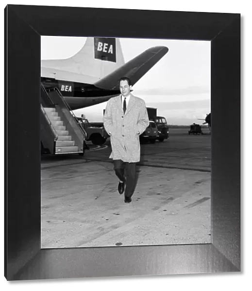 Dutch magician Fred Kaps arriving at Heathrow Airport before his appearance before forty