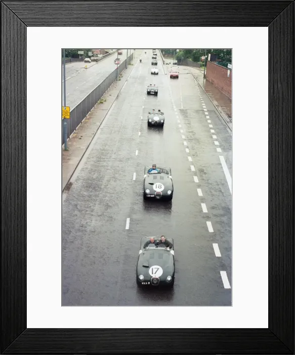 Framed Print : Sterling Moss takes takes Evening Telegraph reporter Alan Poole for a spin in the same Framed Print : Sterling Moss takes takes Evening Telegraph reporter Alan Poole for a spin in the same