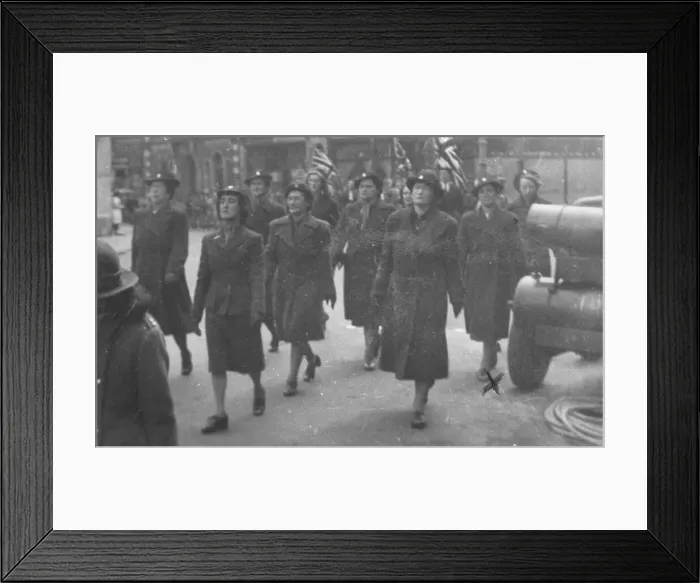 Framed Print : WVS on parade led by Miss Hilda Rovers on VE Day in Bridgend, 1945 Framed Print : WVS on parade led by Miss Hilda Rovers on VE Day in Bridgend, 1945
