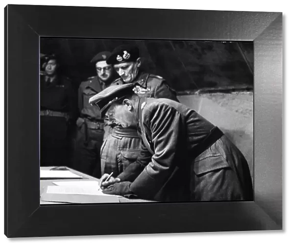 General Kinzel (German General of Infantry) puts his signature to the surrender of